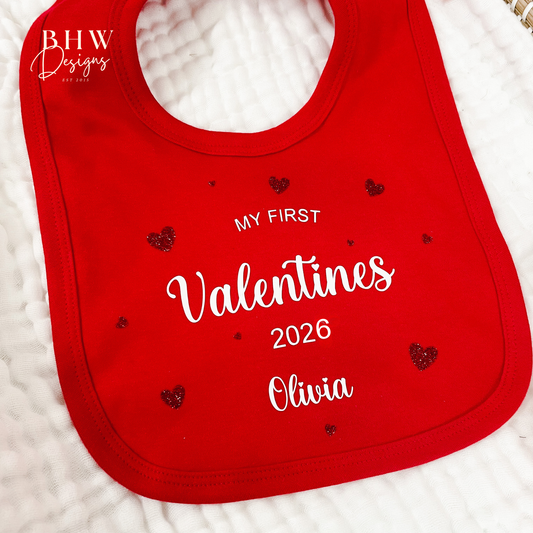 Red bib with 'My First Valentine's 2026 Olivia' text on a white background