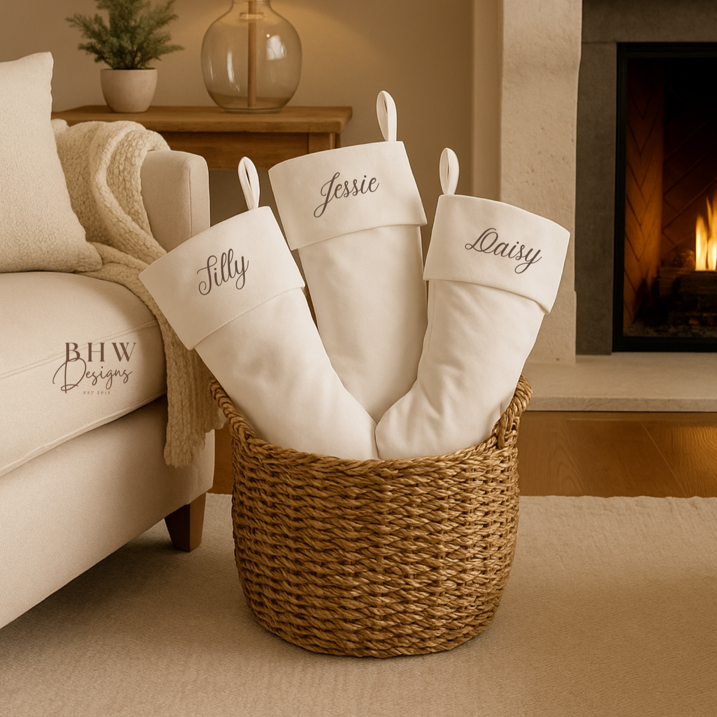 personalised stockings in a basket by a fireplace in a cozy living room.