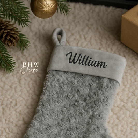 Grey textured Christmas stocking with personalised name 'William' on it.