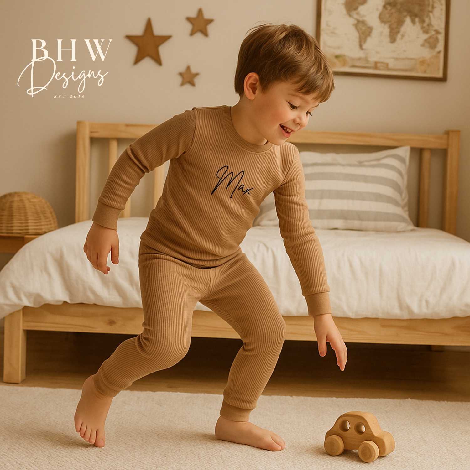 boy in a stone outfit playing with a wooden toy car in a bedroom setting