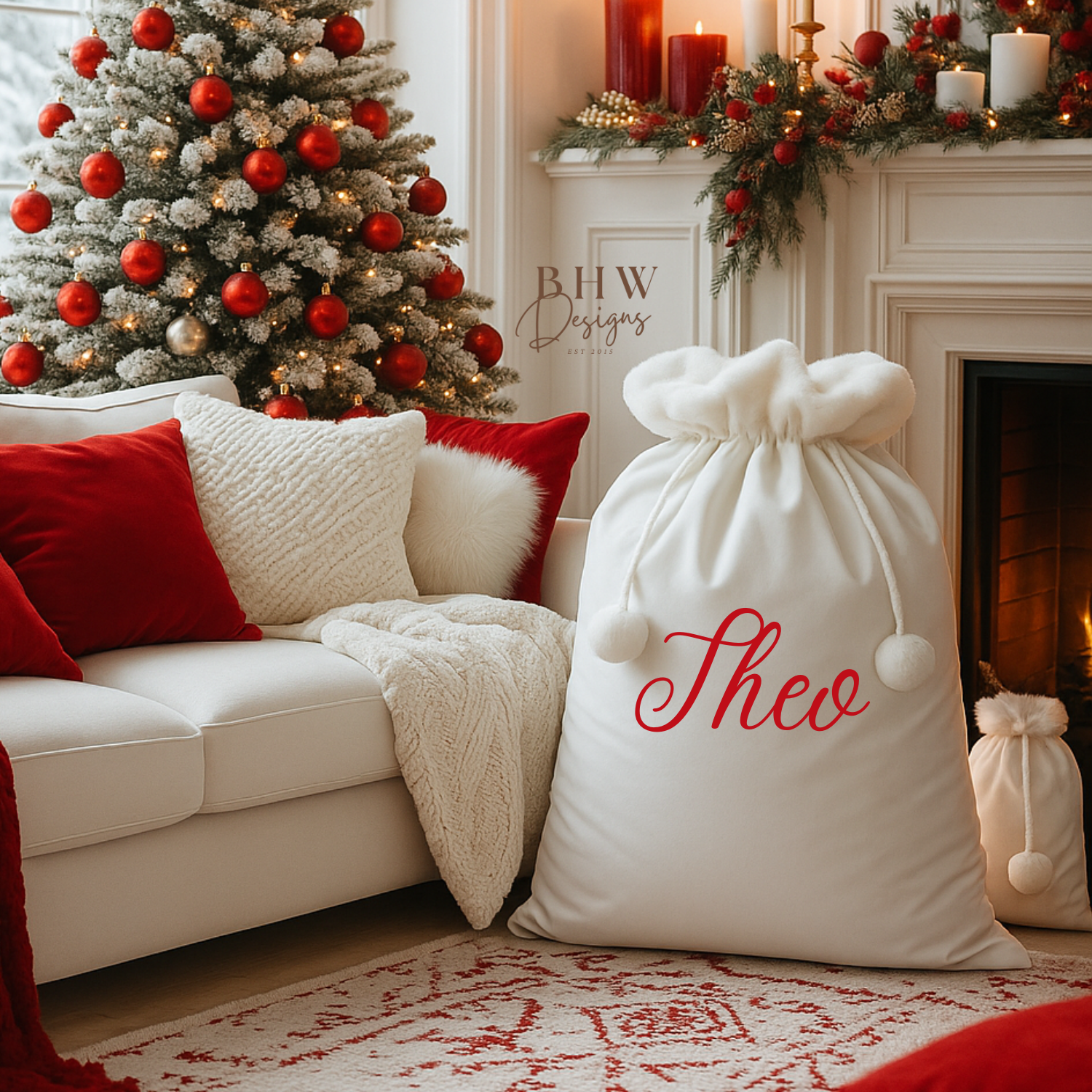 Decorative living room with a white Santa sack with white faux fur trim and pom pom's with Theo on the front in Red