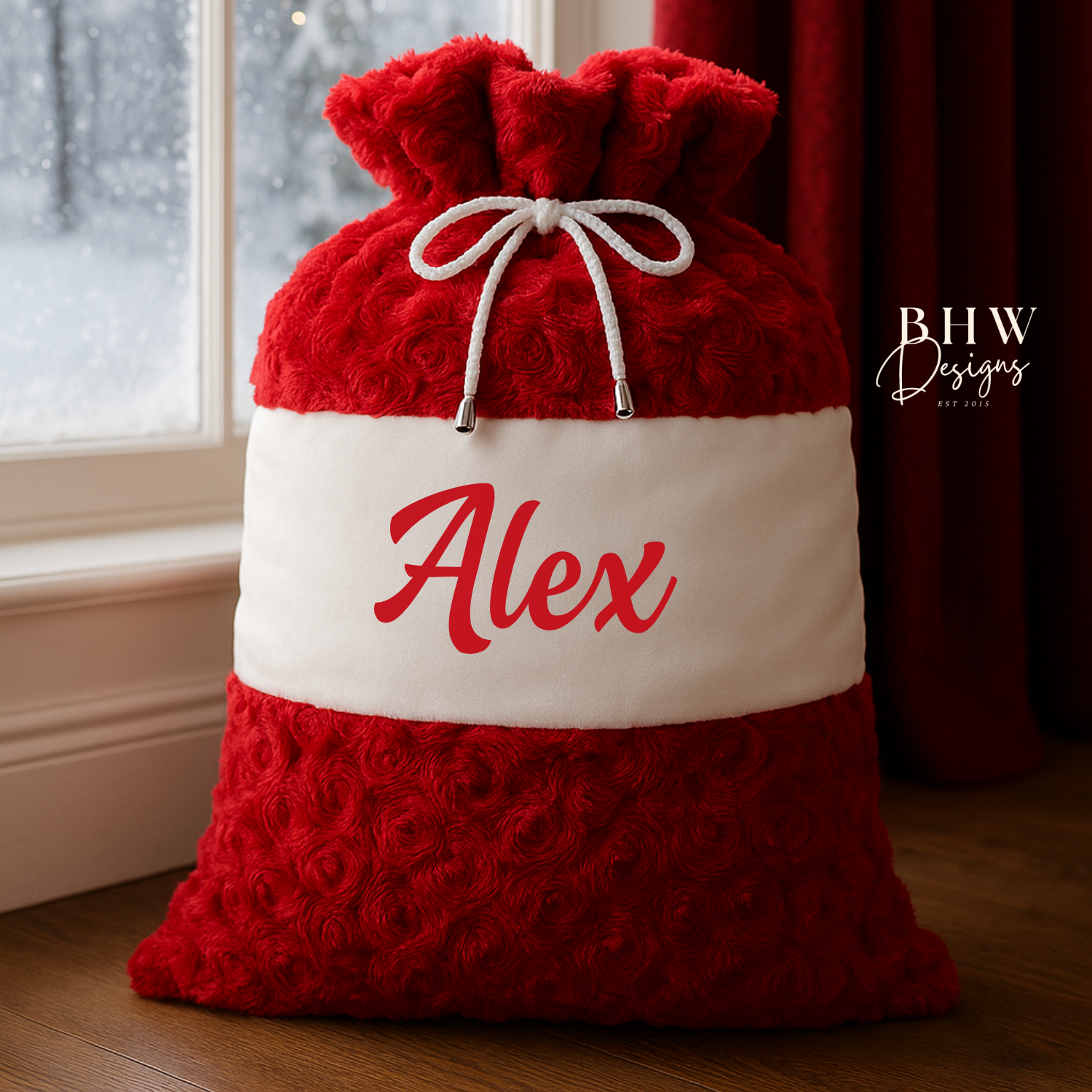 Red and white Santa Sack with 'Alex' on the front in red