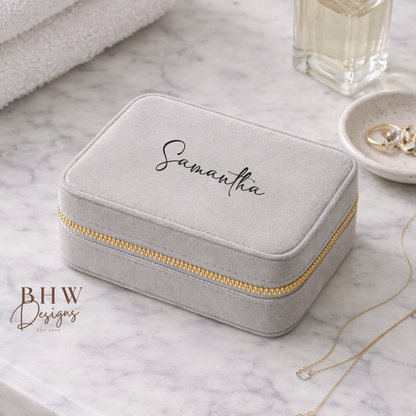 Grey velvet jewellery box with gold zipper and 'Samantha' on the top