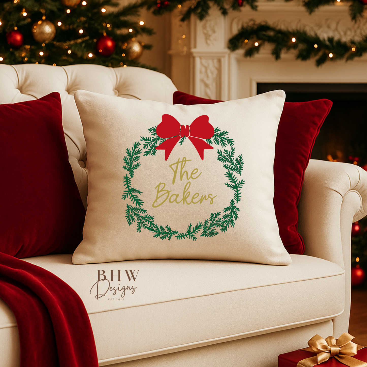 Decorative decorative personalised wreath and bow design cushion cover with Christmas decorations.