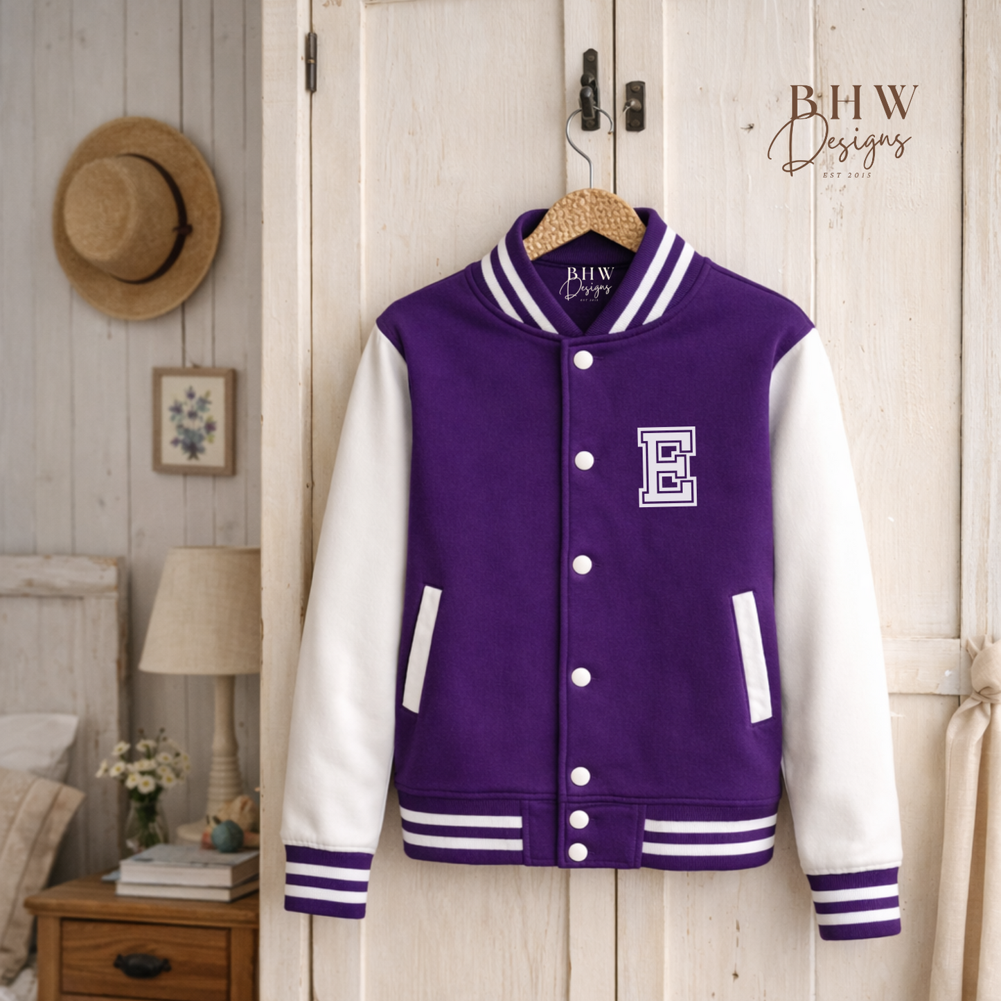 Purple and white varsity jacket with a letter 'E' on a wooden door