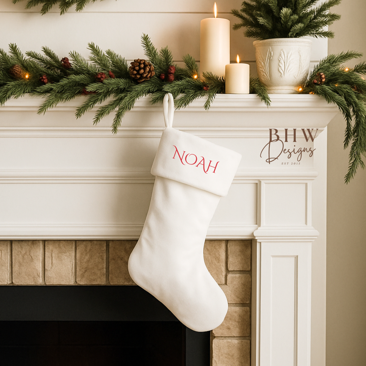 White Christmas stocking with 'NOAH' in red