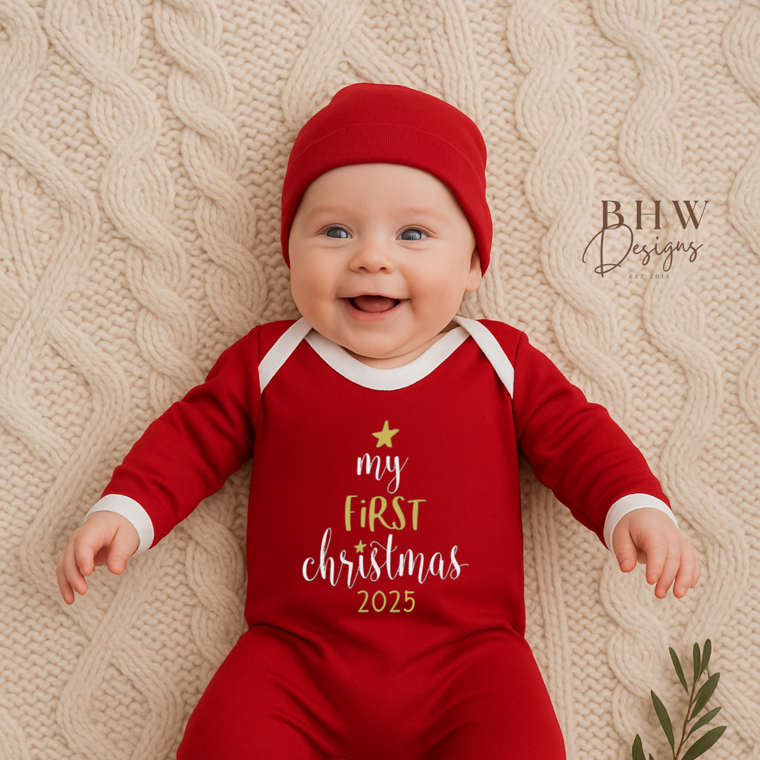 Baby wearing a red 'My First Christmas 2025' outfit 
