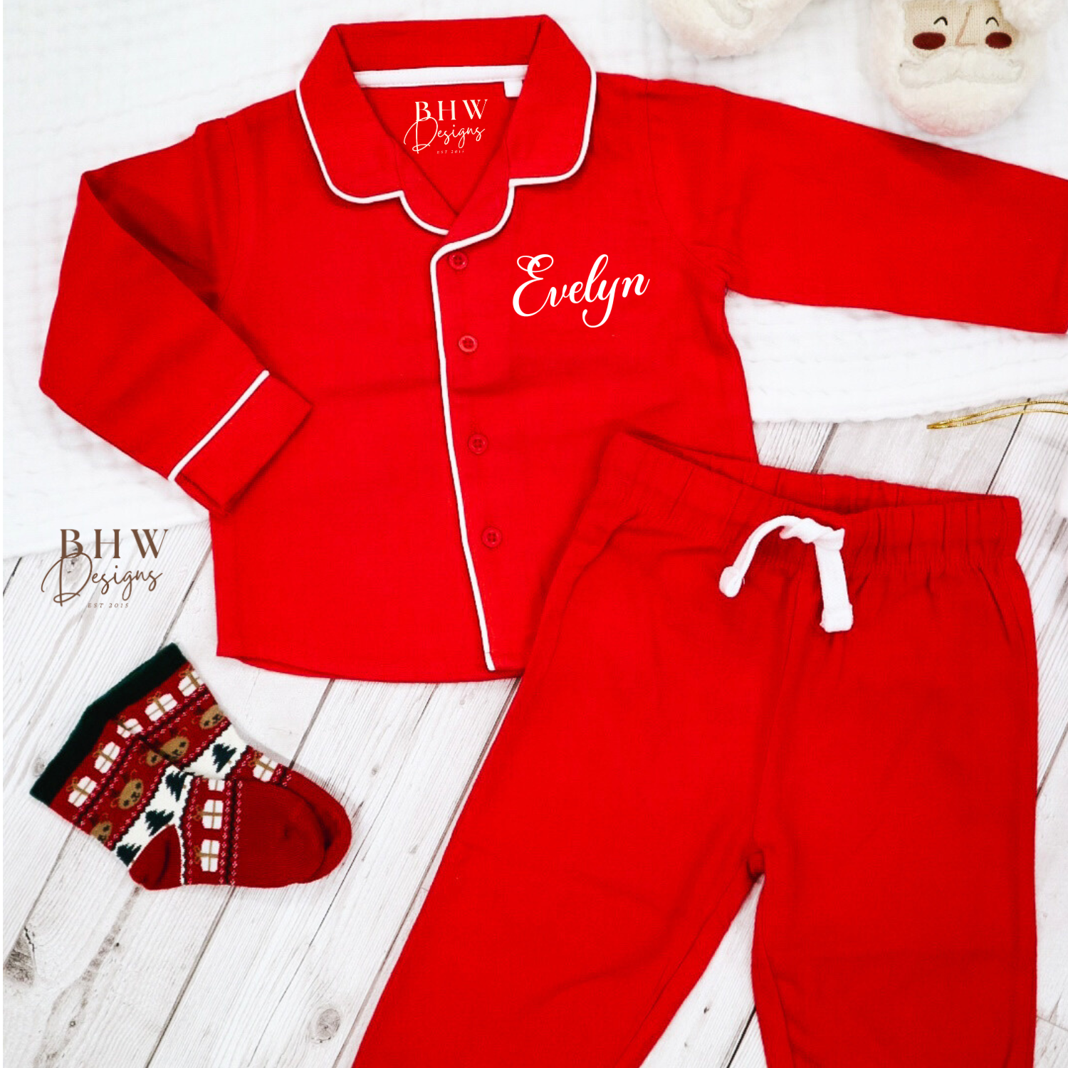 Red children's pyjama set with personalised name. 