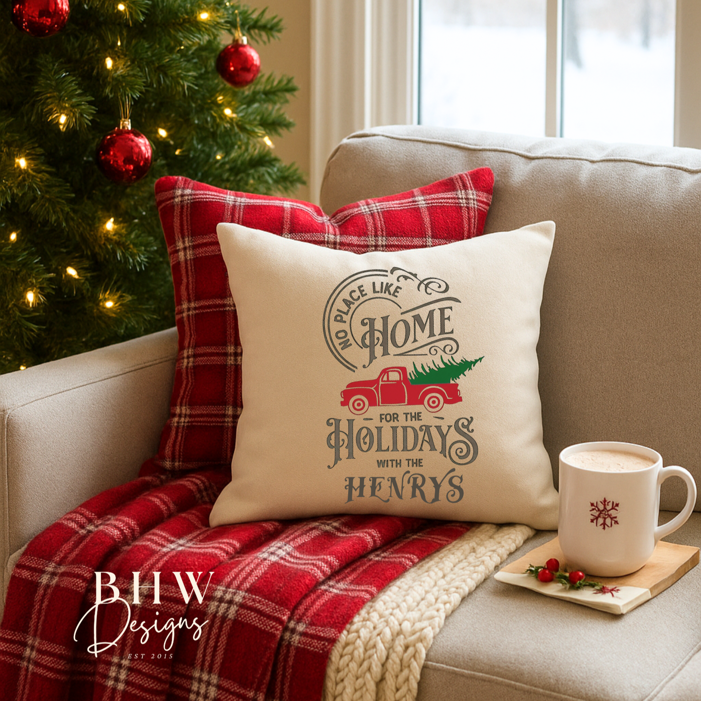 Cozy living room with Christmas decorations, including a tree, plaid pillows, and a 'Home for the Holidays' personalised cushion