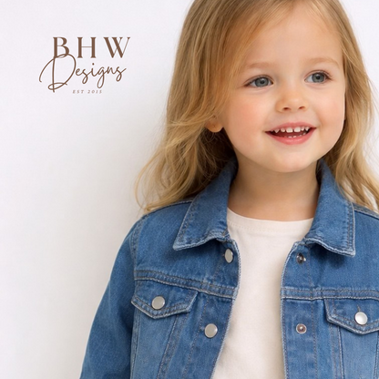 Child wearing a blue denim jacket 