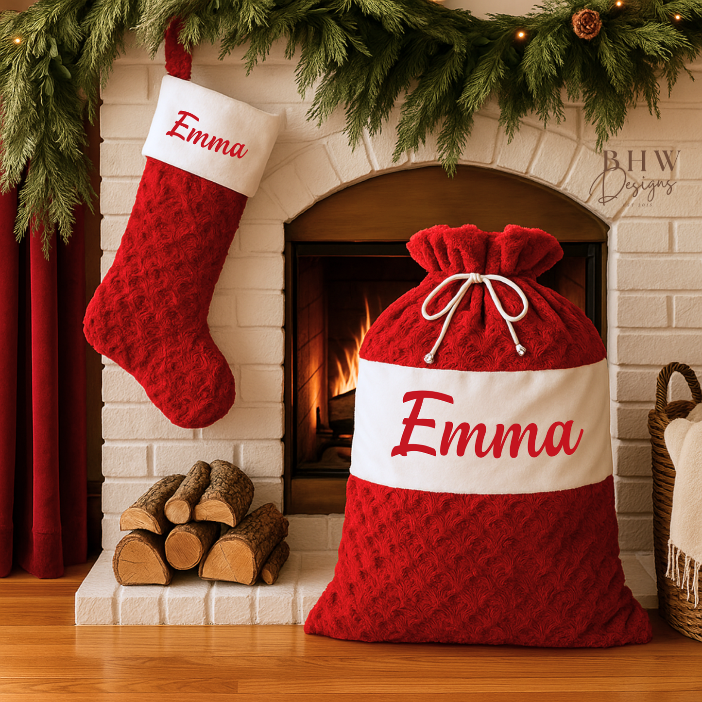 Red and white Christmas stocking and matching sack with 'Emma' on a fireplace mantle.