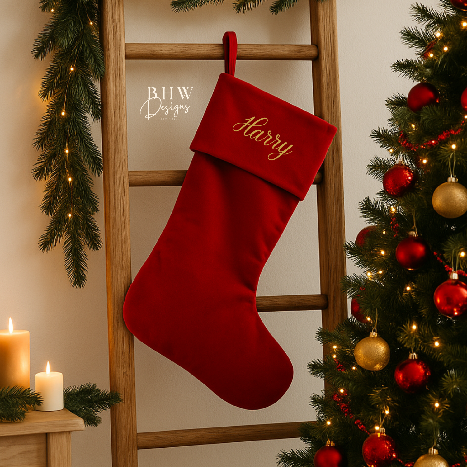 Red Christmas stocking with 'Harry' personalised, hanging on a wooden ladder next to a decorated tree.
