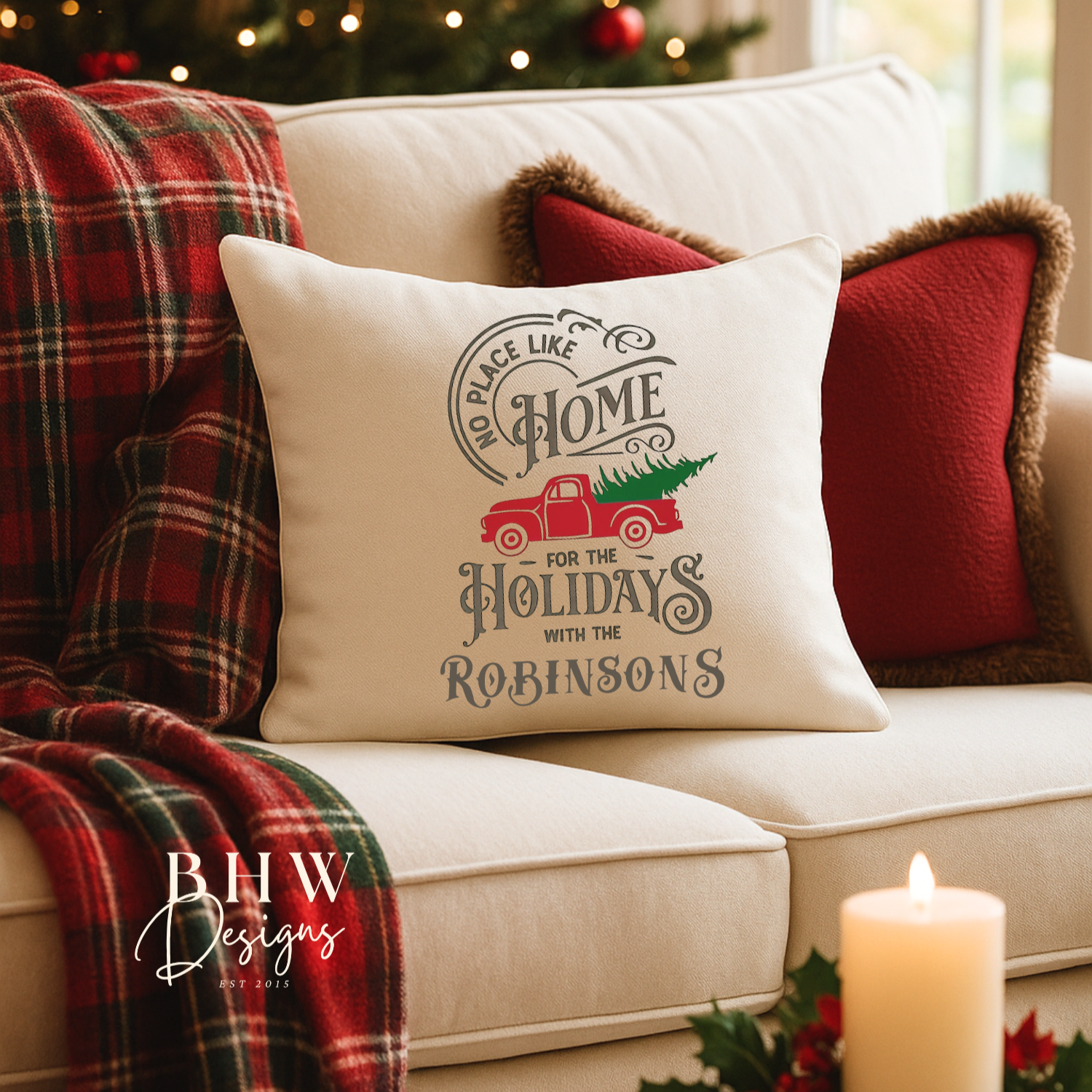 Decorative personalised family name cushion with Christmas design.