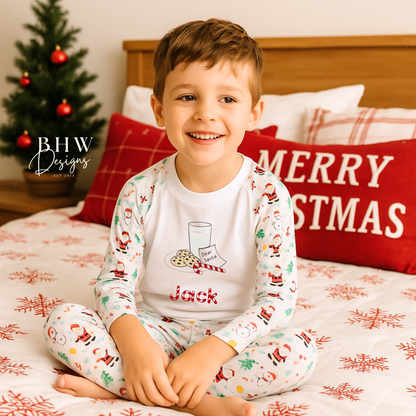 Child wearing Christmas-themed personlaised pyjamas 