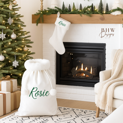 White santa sack and stocking with 'Rosie' on it in green 