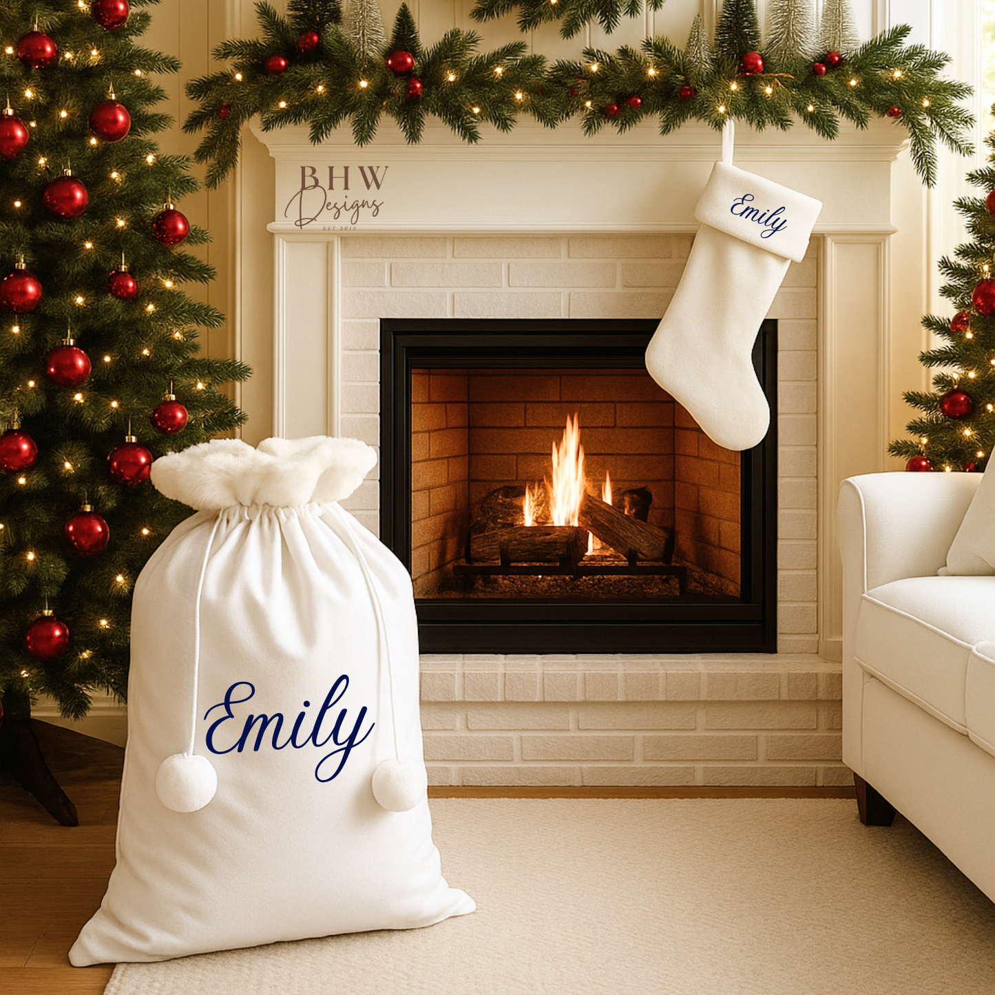 Christmas scene with personalised white sacks and stocking with Emily on the front in Navy Blue 