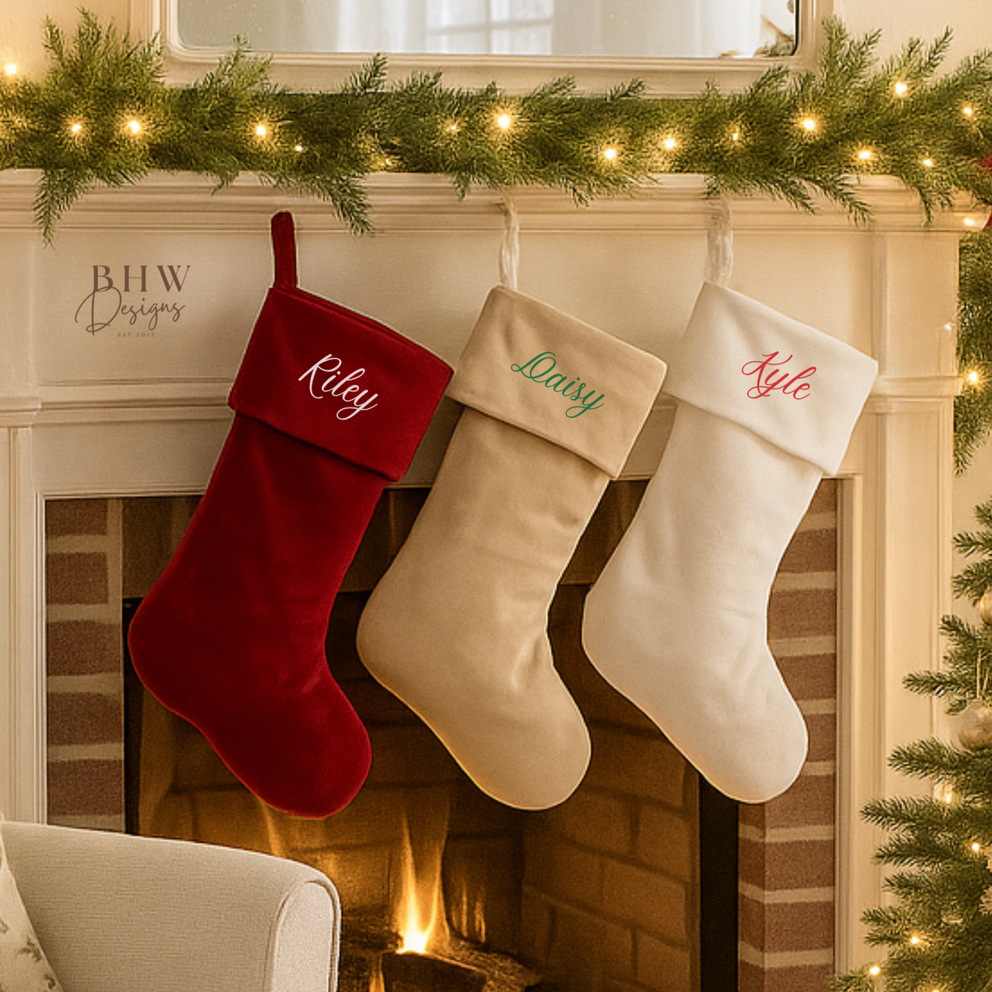 Three Christmas stockings hanging on a fireplace mantle with personalised names.