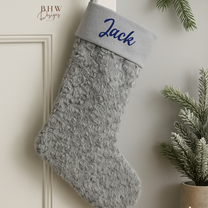 Grey textured Christmas stocking with 'Jack' on it in Navy blue