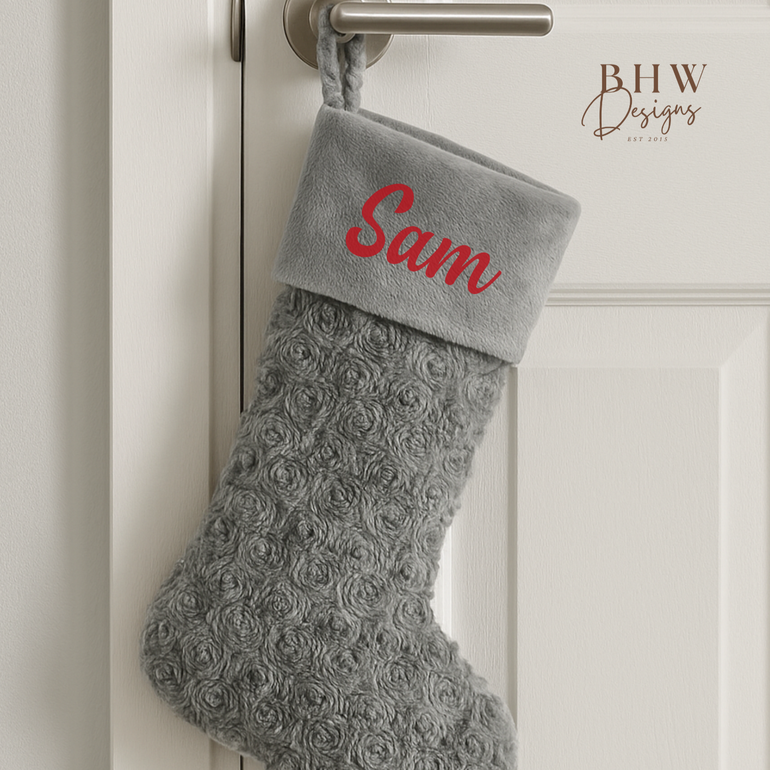 Grey textured Christmas stocking with 'Sam' on the front in red