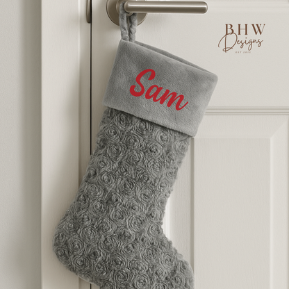 Grey textured Christmas stocking with 'Sam' on the front in red