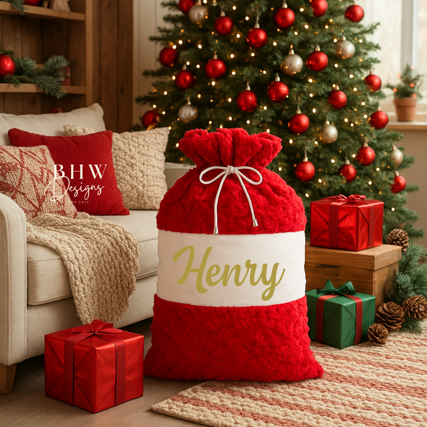 Red and white Christmas sack with 'Henry' written on it on gold
