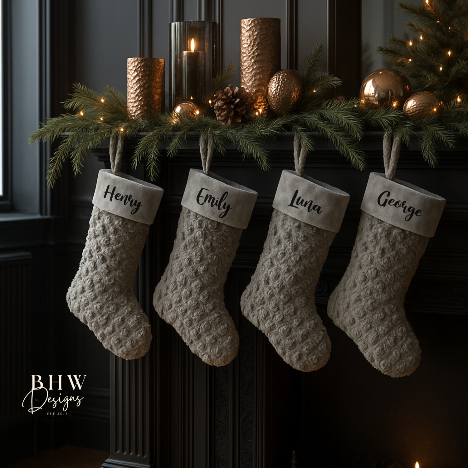 Four textured stockings hanging on a fireplace mantle with decorative items.