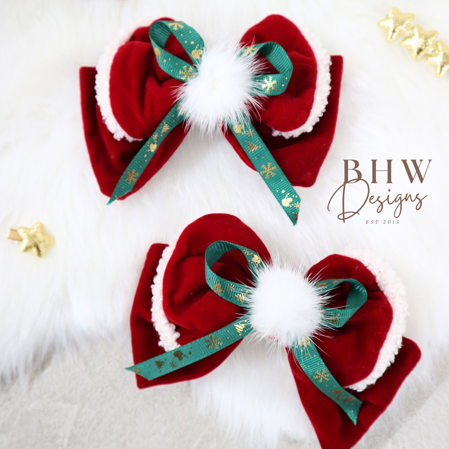 Red hair bows with white fur pom pom center and green ribbons 