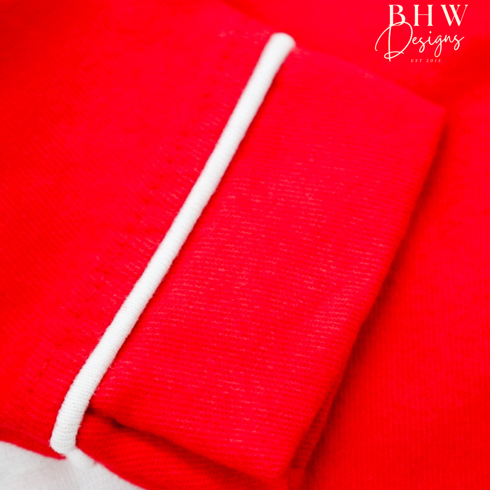 Close up of the brushed cotton sleeve with white binding 