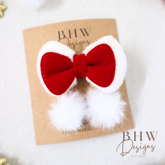 Red and white bow hair accessory on a brown card with 'BHW Designs' branding.