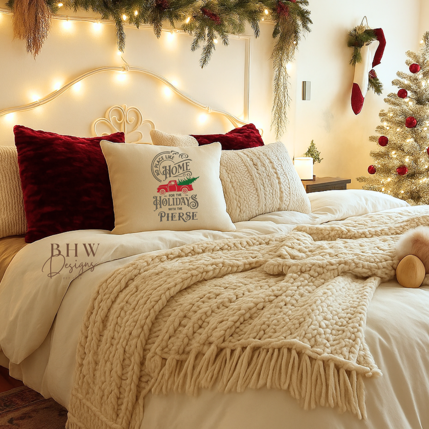 Cozy bedroom decorated for Christmas with a bed, garland, and stockings with a personalised family name no place like home christmas cushion. 