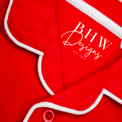 Red pyjamas with white trim