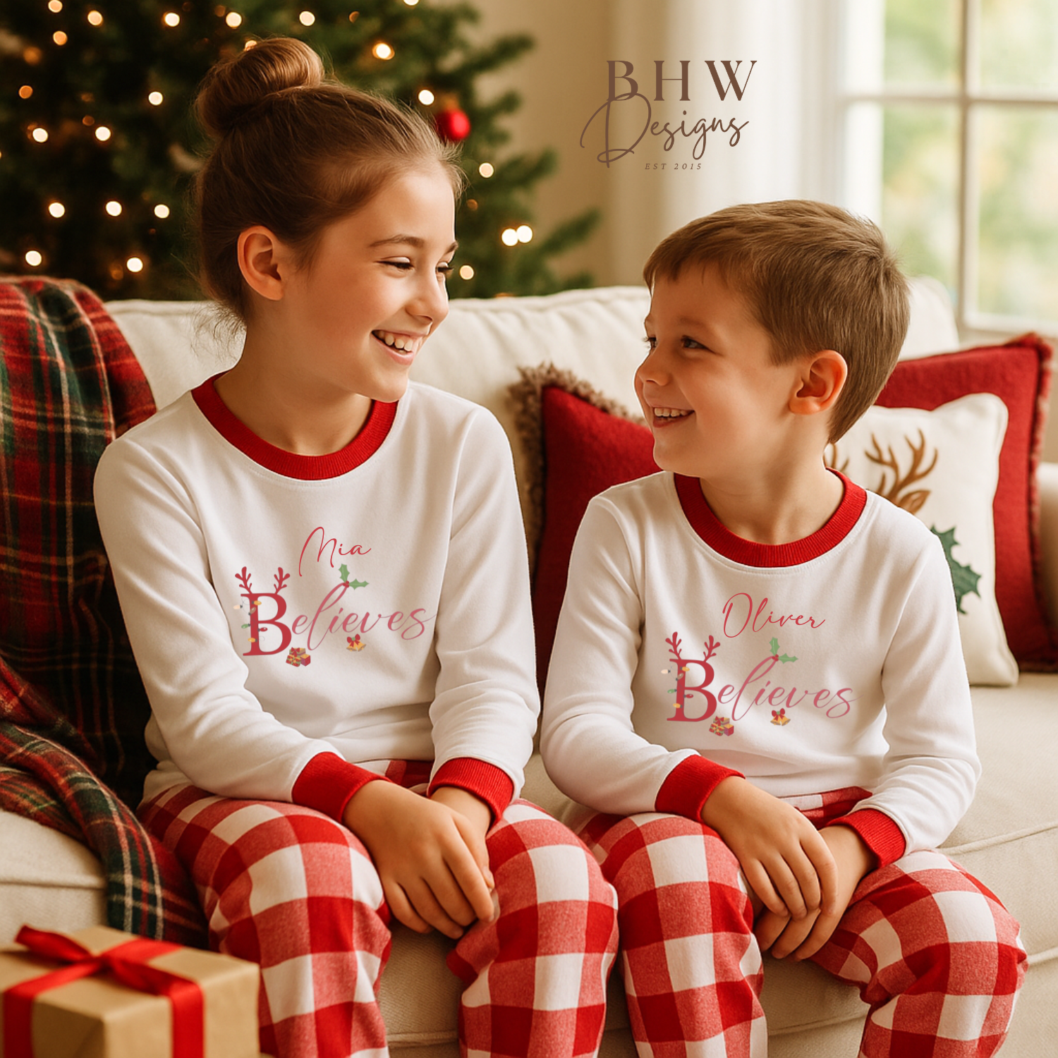 Two children wearing matching Christmas pajamas 