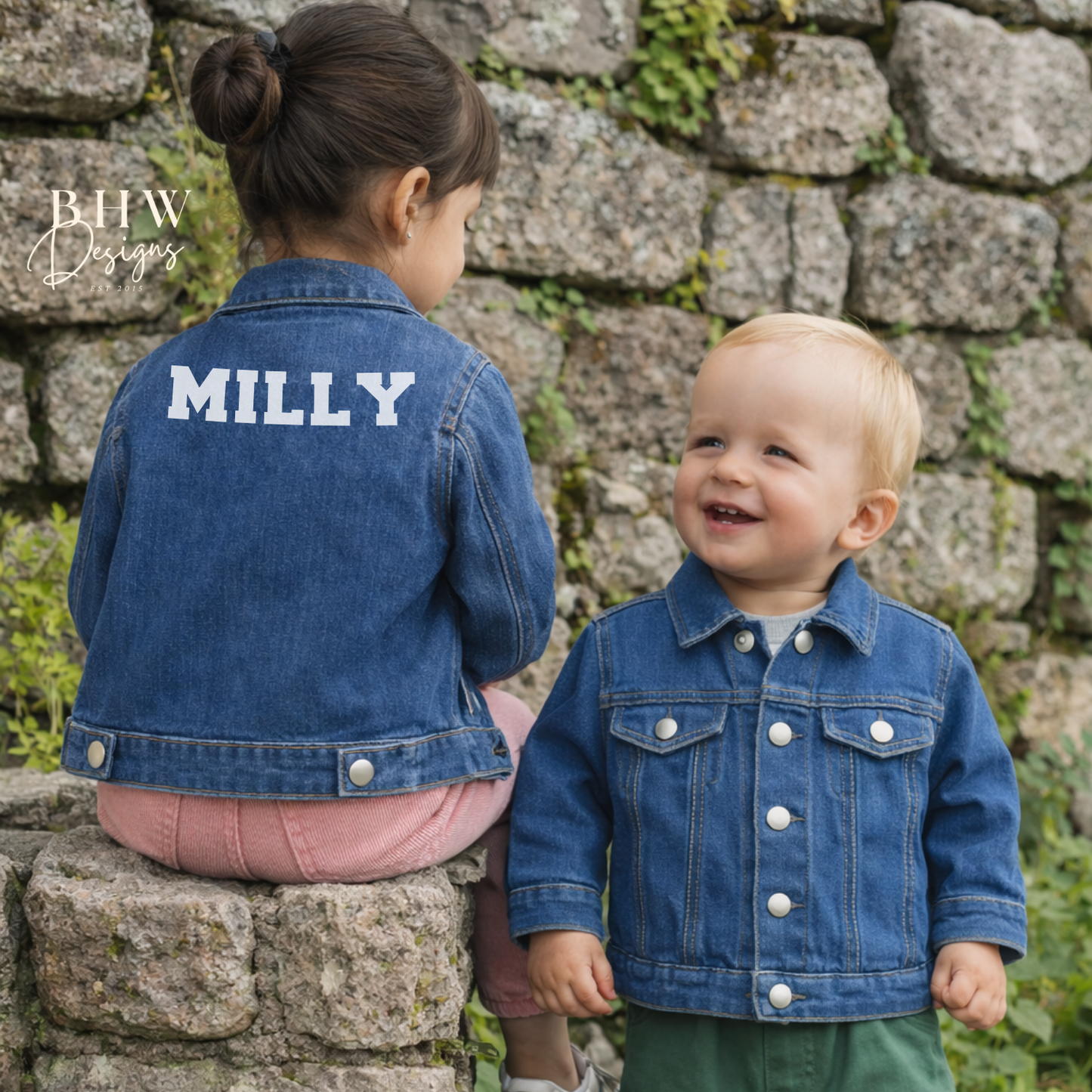 Two children wearing denim jackets with 'MILLY' on the back