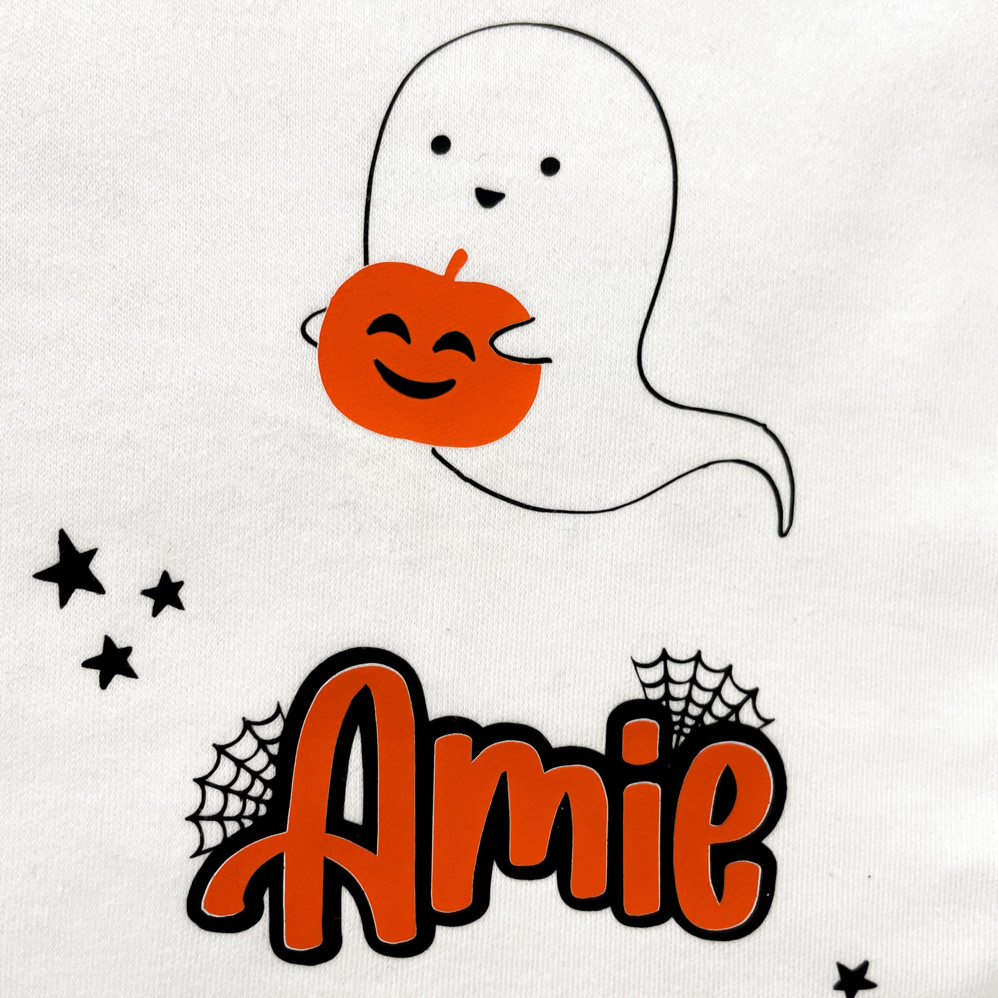 Ghost holding a pumpkin with the name 'Amie' on a white background baby romper